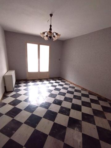 Appartement 64m² env. Lumineux, garage, cave.