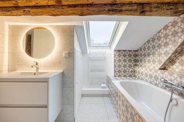 Un duplex comme une maison avec jardin et balcon