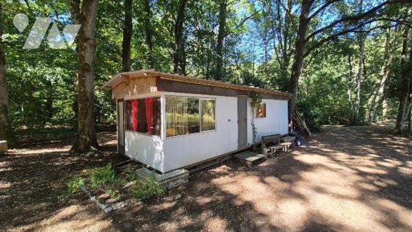 2 MIN GORRON : parcelle de terre boisée avec 2 étangs et mobil home sur 1ha62ca 