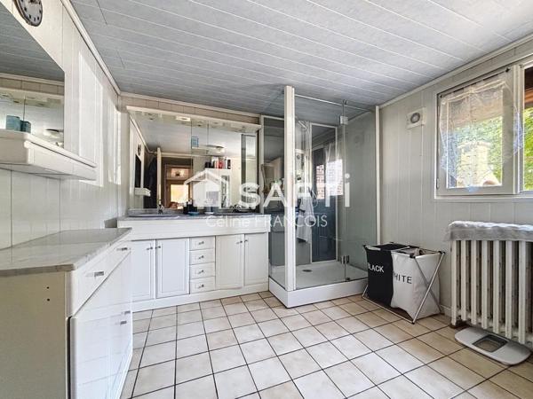 Maison familiale avec garage et terrain