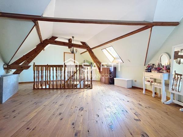 Maison familiale avec garage et terrain