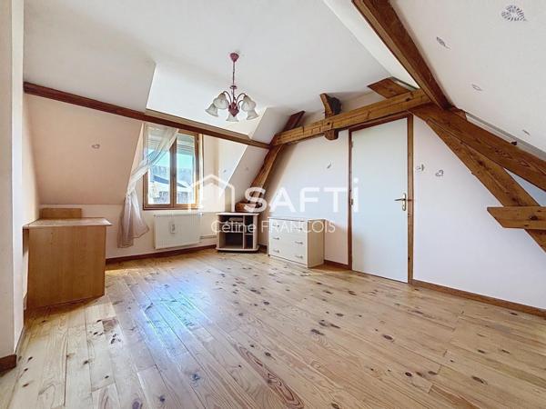 Maison familiale avec garage et terrain