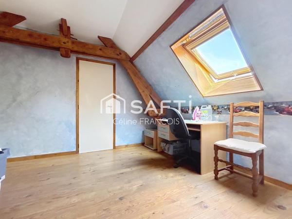 Maison familiale avec garage et terrain