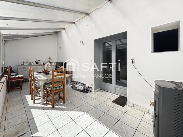 Maison familiale avec garage et terrain