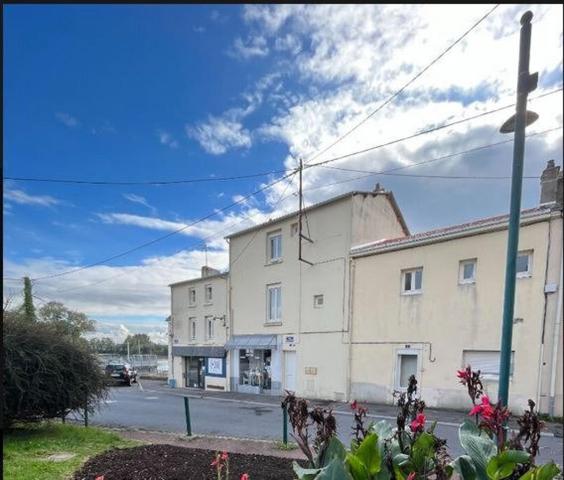 À seulement 8 minutes du centre de Nantes – Appartement T3 en duplex avec vue sur la Loire- 9420€ de revenus locatifs/an