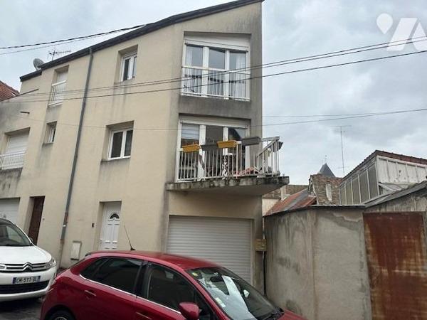 Maison de ville, T 3/4 , d'une superficie d'environ 70 m², avec jardinet privatif