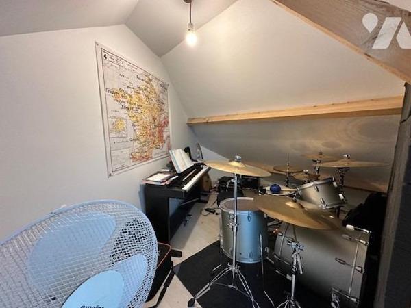 Maison de ville, T 3/4 , d'une superficie d'environ 70 m², avec jardinet privatif