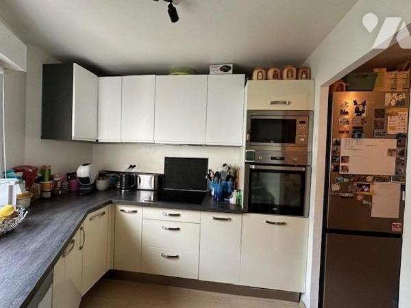 Maison de ville, T 3/4 , d'une superficie d'environ 70 m², avec jardinet privatif