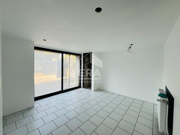 À vendre - Spacieuse maison de ville de 196 m² avec garage et cour