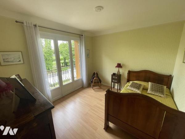 Maison mitoyenne familiale avec jardin
