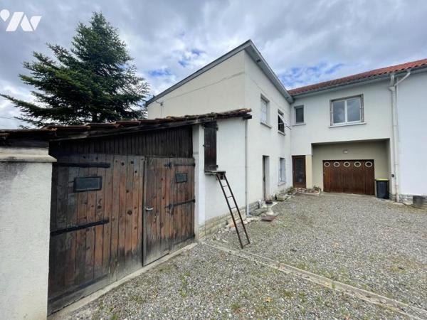 Maison mitoyenne familiale avec jardin