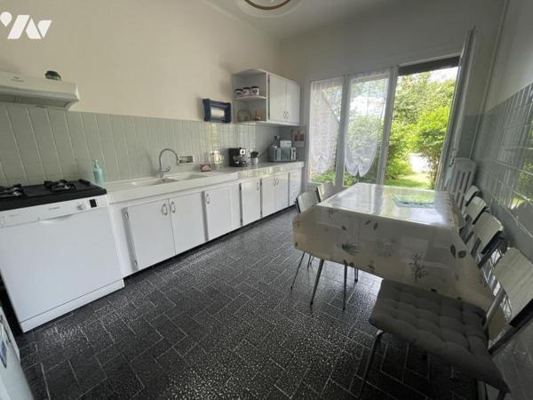 Maison mitoyenne familiale avec jardin