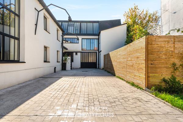 Ancien garage transformé en loft à proximité des bords de Marne