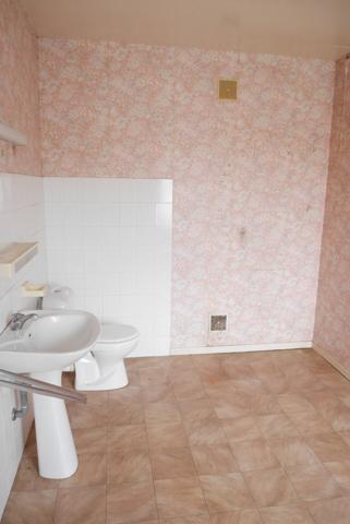 MAISON INDIVIDUELLE AVEC GARAGE ET TERRAIN