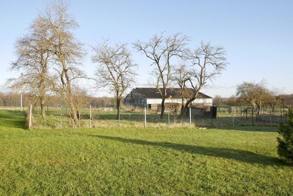 MAISON INDIVIDUELLE AVEC GARAGE ET TERRAIN