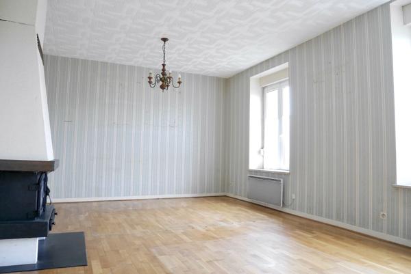 MAISON INDIVIDUELLE AVEC GARAGE ET TERRAIN