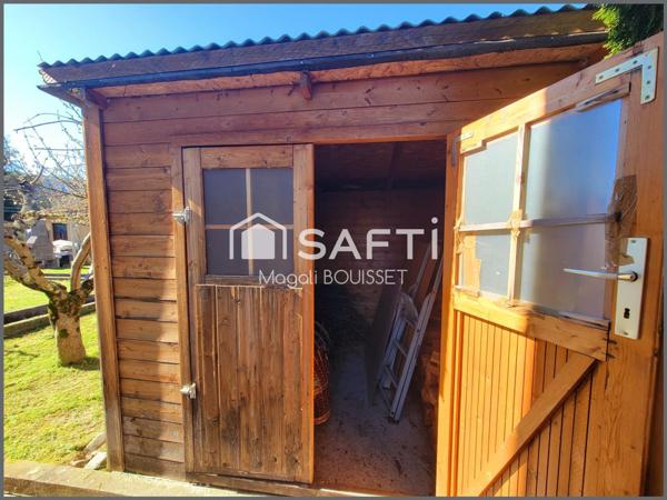 Maison plain pied T4 de 89m², deux chambres, un bureau, une terrasse, garage, dépendance, abri jardin