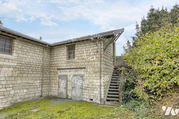 Local professionnel de 335 m2 et maison familiale sur un terrain de 950 m2 parc de Maisons Laffitte 
