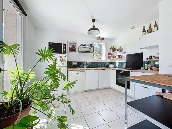 DOUSSARD _ Appartement 2 pièces en rez-de-jardin avec jardin et piscine à vendre