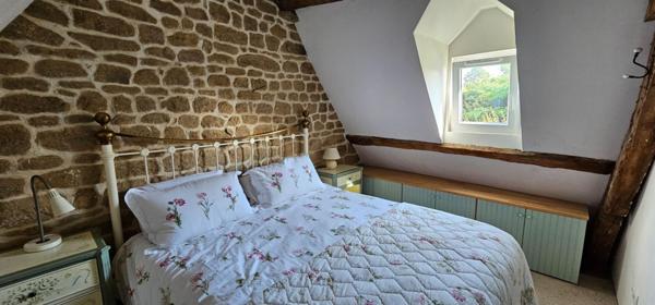 Maison en pierre en bourg