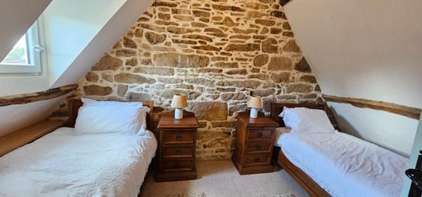 Maison en pierre en bourg