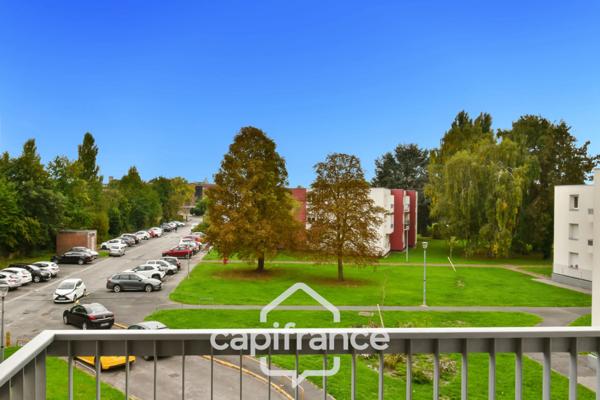 Appartement T4 lumineux avec balcon, et stationnement privatif