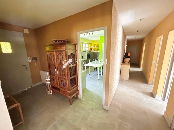 Maison 8 pièce(s) 5 chambre(s) 205 m²