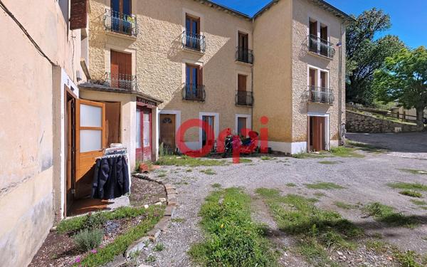 Appartement à vendre    4 pièces • 112 m2 Enveitg