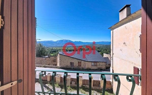 Appartement à vendre    4 pièces • 112 m2 Enveitg