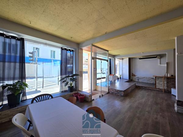 Ensemble immobilier avec local commercial, appartement T4, cour et sous-sol complet