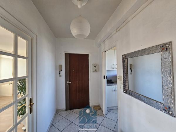 Appartement 4 pièces 3 chambres avec balcon, cave et stationnement libre sécurisé