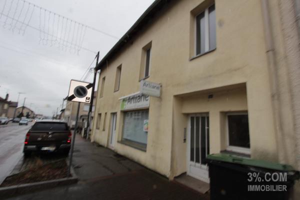 Immeuble de rapport 7 appartements, 1 Local commercial, 9 garages Thaon-les-Vosges (88150)