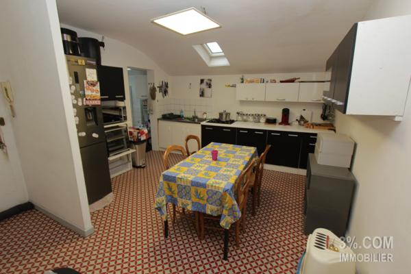 Immeuble de rapport 7 appartements, 1 Local commercial, 9 garages Thaon-les-Vosges (88150)