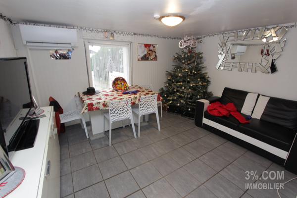 Immeuble de rapport 7 appartements, 1 Local commercial, 9 garages Thaon-les-Vosges (88150)