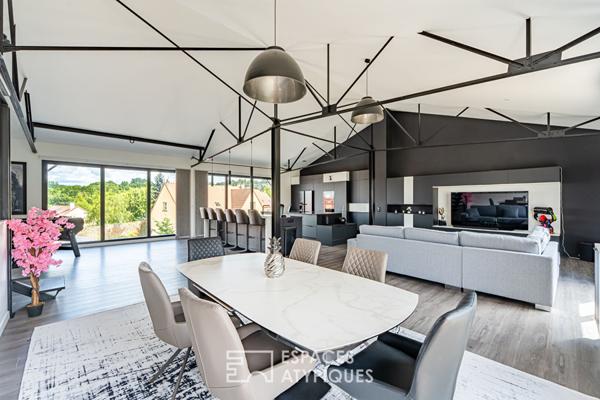 Loft et son jardin dans un ancien atelier réinventé à Aigremont