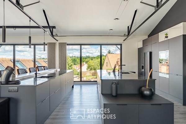 Loft et son jardin dans un ancien atelier réinventé à Aigremont
