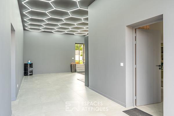 Loft et son jardin dans un ancien atelier réinventé à Aigremont