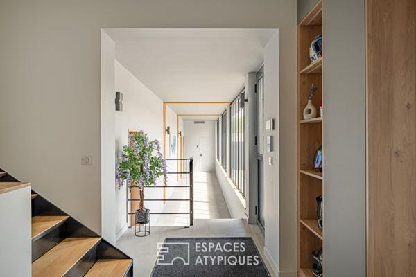 Loft et son jardin dans un ancien atelier réinventé à Aigremont