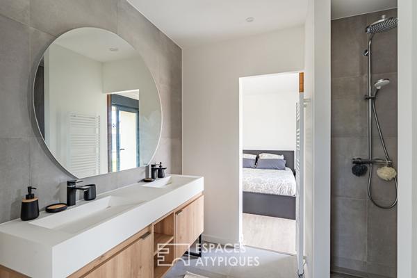 Loft et son jardin dans un ancien atelier réinventé à Aigremont