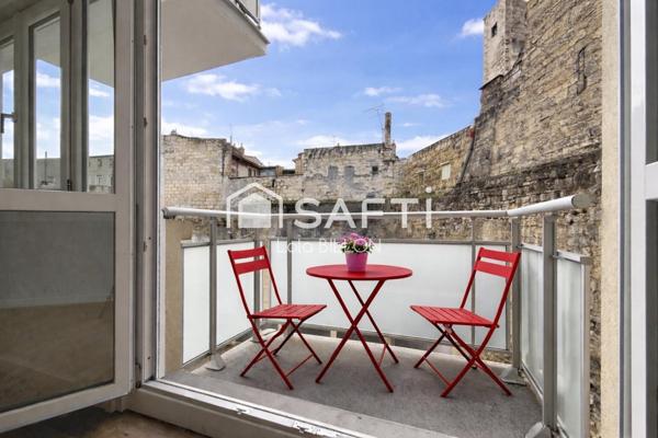 Studio avec balcon, cave et parking en centre ville