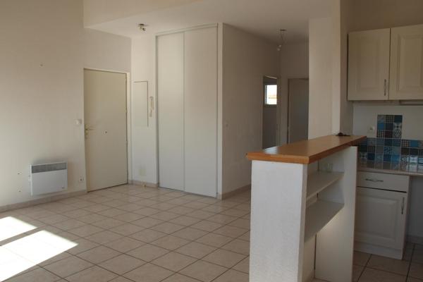 APPARTEMENT AVEC TERRASSE - GARAGE - ASCENSEUR