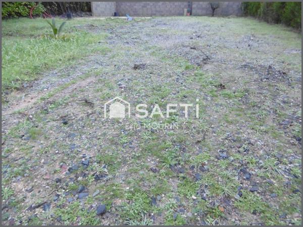 Terrain constructible,  proche des commodités.
