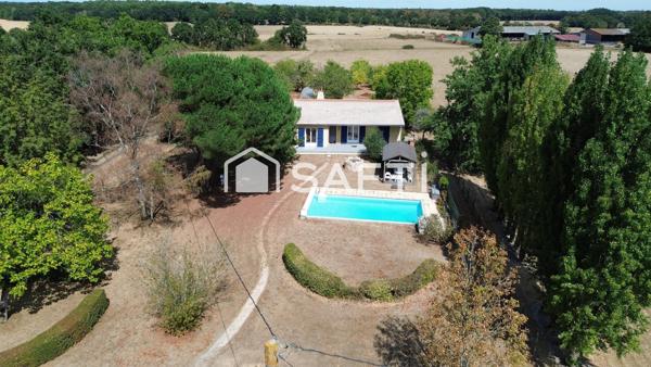 Maison familiale avec piscine et grand terrain