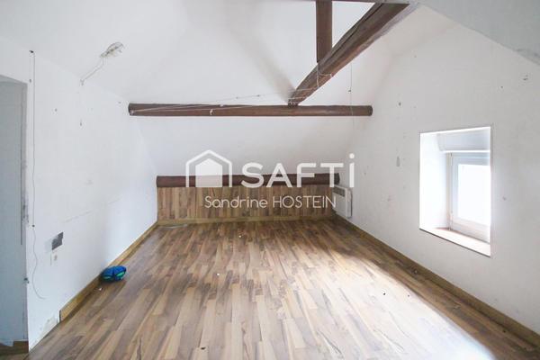 Immeuble composé de 4 bureau et de 3 appartements