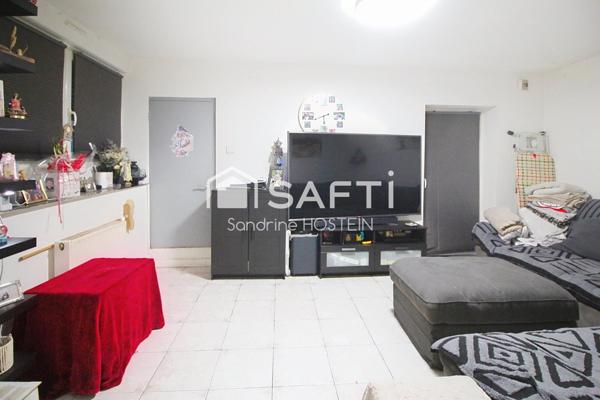 Immeuble composé de 4 bureau et de 3 appartements