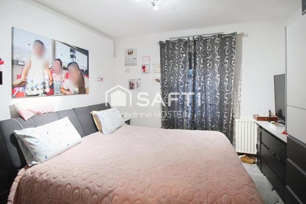 Immeuble composé de 4 bureau et de 3 appartements