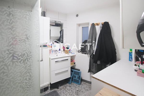 Immeuble composé de 4 bureau et de 3 appartements