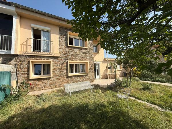 Maison familiale de 105 m² avec 4 chambres, garage motorisé et jardin à Grazailles