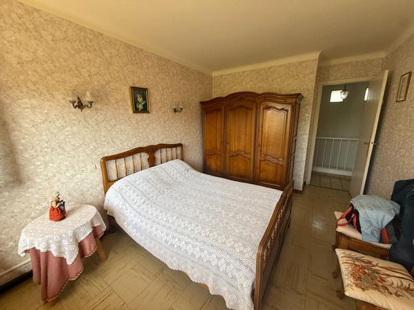 Maison familiale de 105 m² avec 4 chambres, garage motorisé et jardin à Grazailles