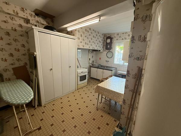 Maison familiale de 105 m² avec 4 chambres, garage motorisé et jardin à Grazailles